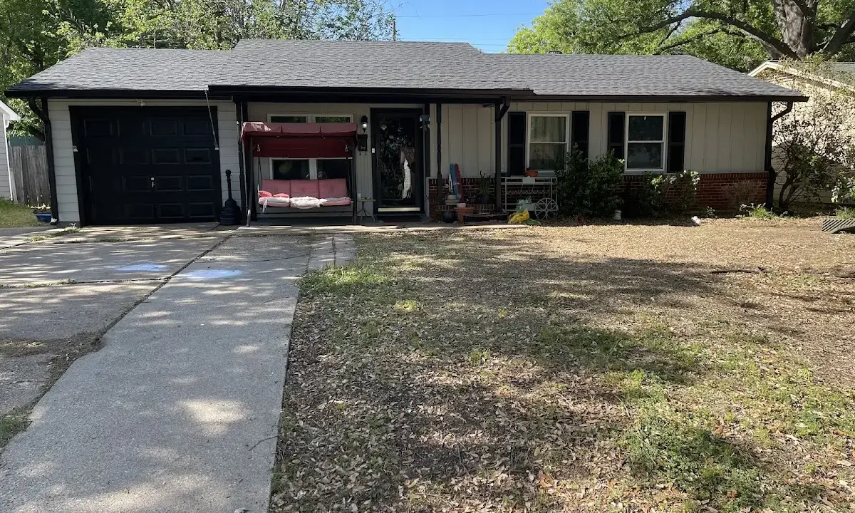 Asphalt Shingle Roof Repair crew at work on a residential roof in Spout Springs